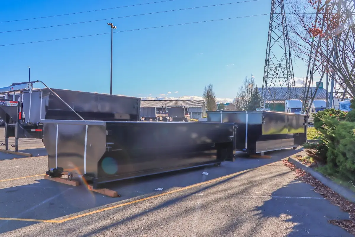 Roll-off dumpster ready for waste disposal at job site for Demolition Dumpster Rental in Newport